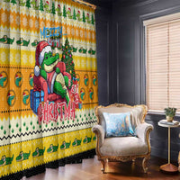 Yellow Christmas curtain with cartoon crocodile holding gifts and a decorated tree print