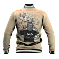 Beige baseball jacket with striped rib cuffs and large back father-and-son graphic