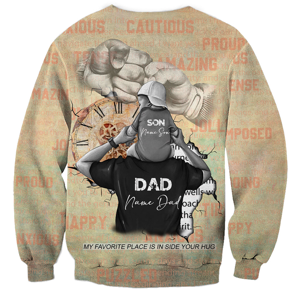 Tan crewneck sweatshirt back with father lifting son graphic, DAD and inside-your-hug text