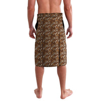 Brown-and-black patterned lavalava skirt with geometric repeat, straight hem