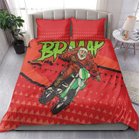 Red motocross Santa duvet with green motorcycle and rider print plus two red pillows