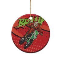 Red ceramic motocross Santa round ornament with gold string, centered product view