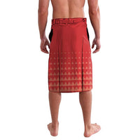 Red board shorts with geometric triangle print, elastic waistband and drawstring