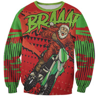 Unisex crewneck sweatshirt with green sleeves and red Santa riding a bike graphic