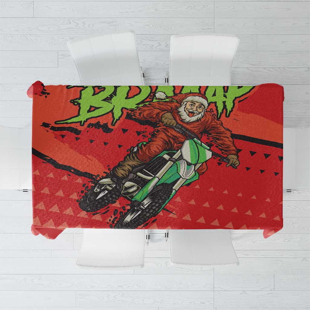 Red motocross Santa Christmas tablecloth with motorcycle graphic and green accents