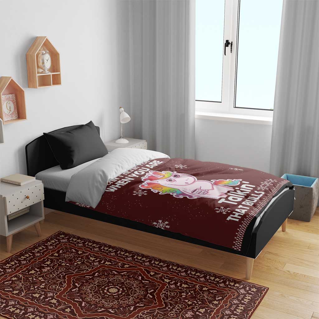 Burgundy unicorn Christmas duvet cover on bed with two black pillows and winter graphic