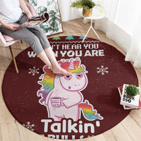 Burgundy round Christmas carpet with unicorn graphic and 'Talkin'' text, with snowflakes