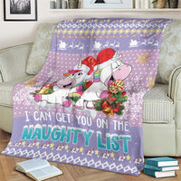Light purple unicorn Christmas blanket with “naughty list” headline and festive icons