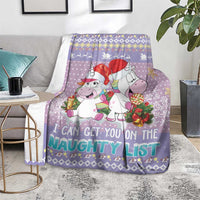 Light purple Christmas blanket with unicorns and colorful “naughty list” text