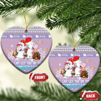 Two light purple unicorn ceramic heart ornaments on tree, "I CAN GET YOU ON THE NAUGHTY LIST"