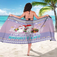 Light purple unicorn Christmas sarong, “Naughty List” slogan across the wrap