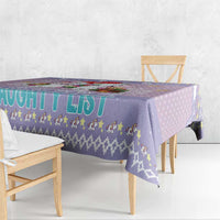 Light purple Christmas unicorn tablecloth with 'Naughty List' lettering and icons
