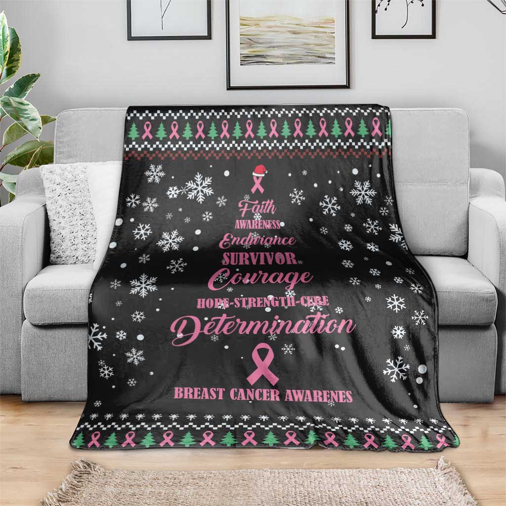 Black breast cancer Christmas blanket draped over sofa; pink ribbon, snowflakes and trees