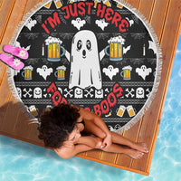 Round black beach blanket with ghost and beer print, white fringe edge