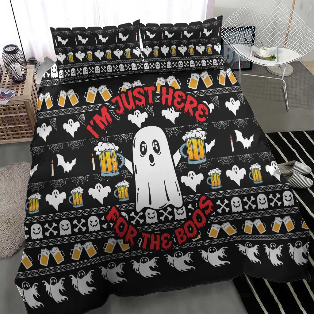 Black Christmas duvet set featuring smiling ghost center, beer mugs, bats, and skulls
