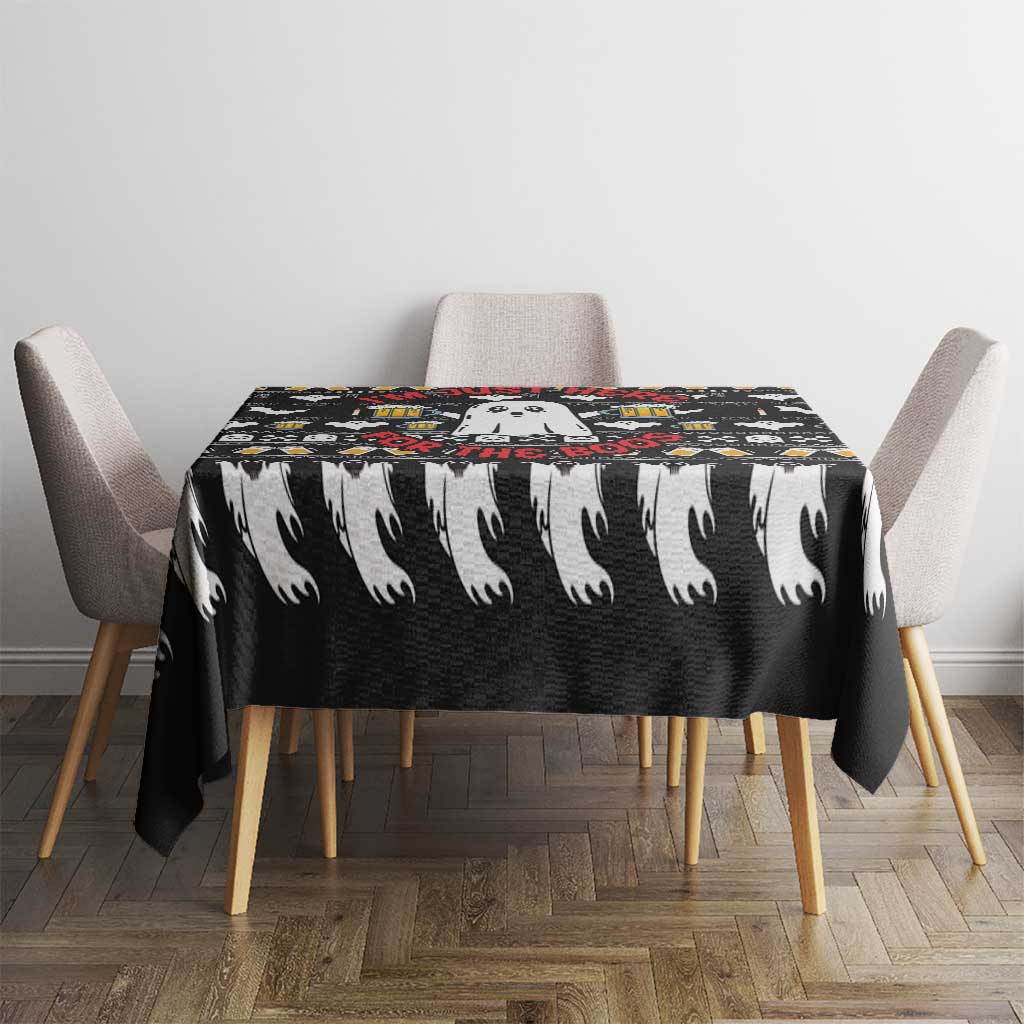Black ghost-themed tablecloth with beer mug accents on a square dining table
