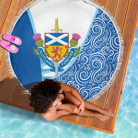 Round beach blanket with Scotland crest and blue swirl panel, fringed edge
