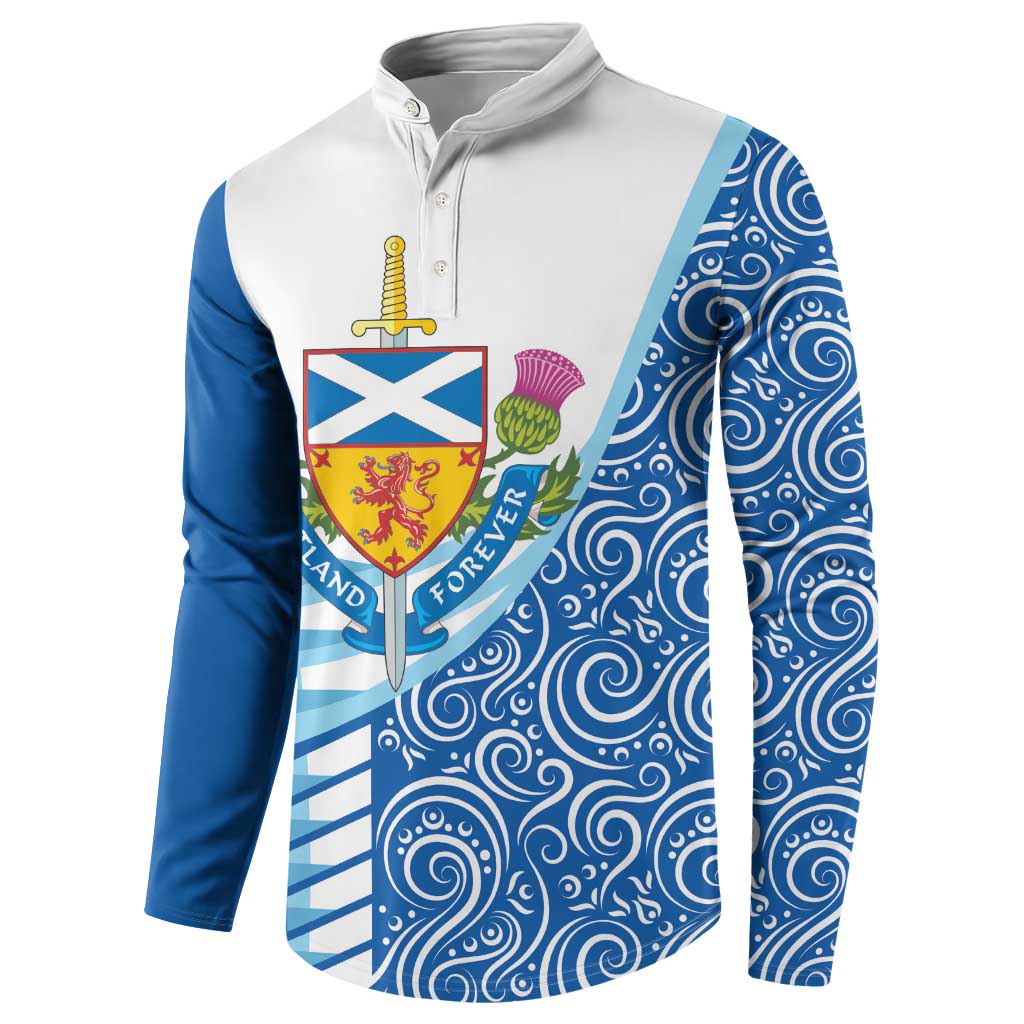 Blue and white button sweatshirt, front chest crest shield with swirling design