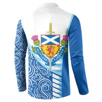 White and blue button sweatshirt, crest graphic on back with swirling swirl pattern