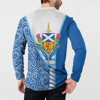 Blue and white button sweatshirt, crest shield centered on back with swirl sleeves