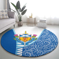 Round circular rug featuring Scotland lion rampant crest, thistle details, blue swirl design