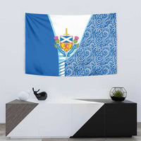 Blue and white wall tapestry with central crest emblem and side stripe panels
