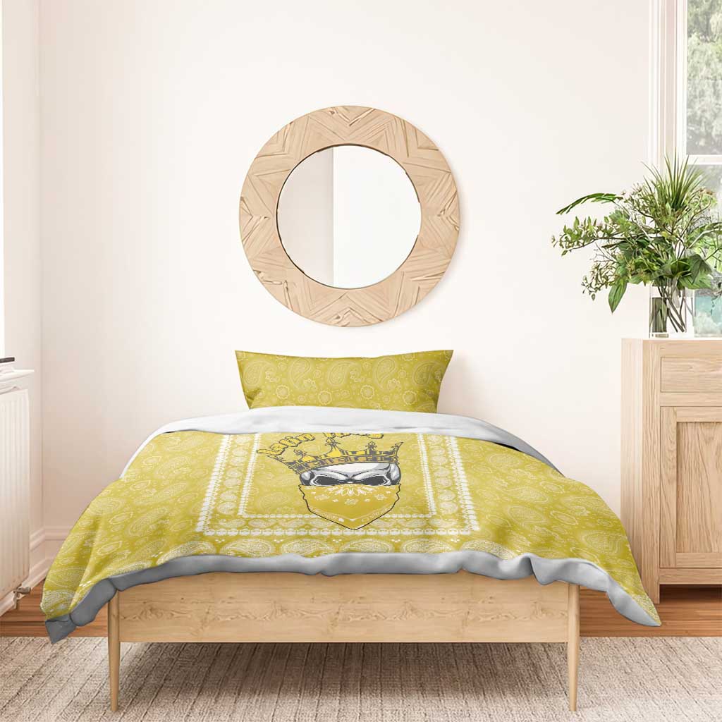 Yellow paisley duvet cover with king crown graphic and two matching pillows