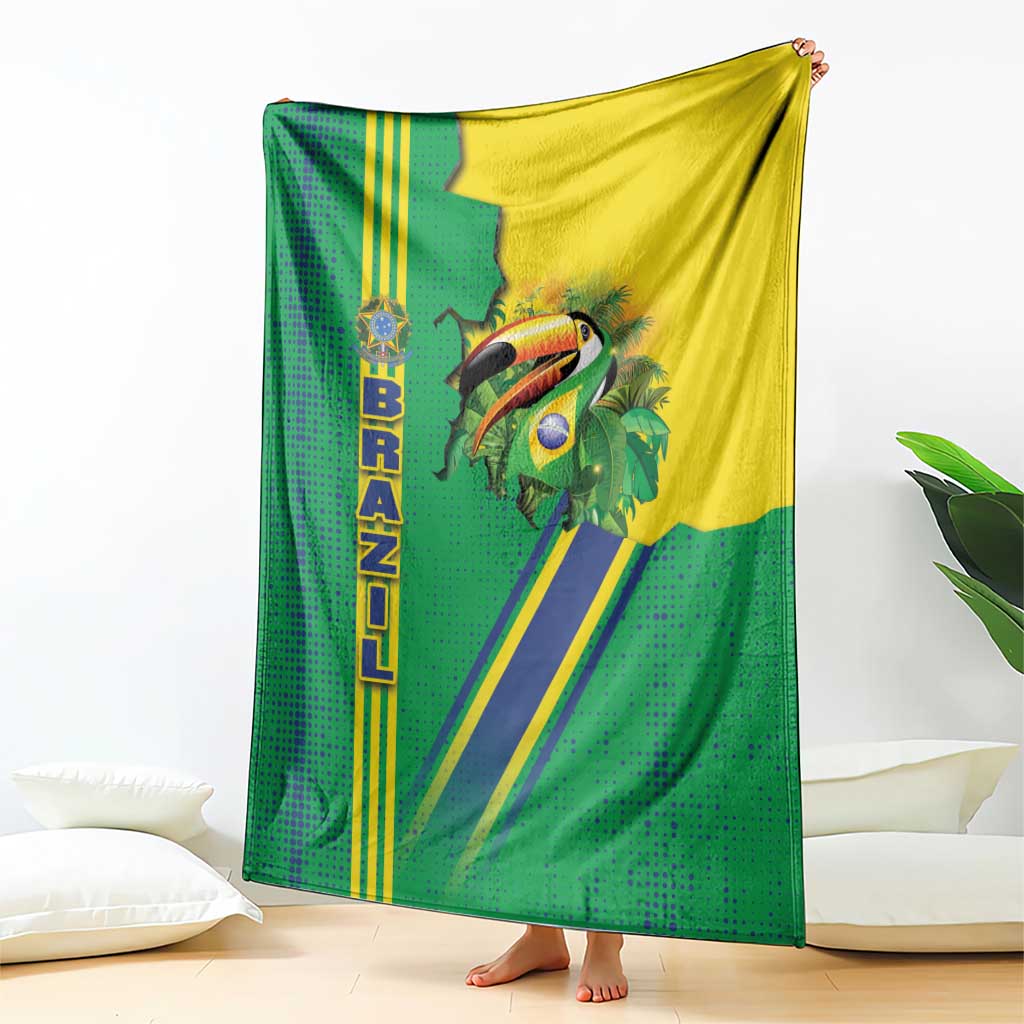 Green Brazil flag toucan blanket folded upright, with yellow and blue diagonal stripes