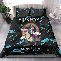 Black bedding set with two pillows, blue splatter accents, dinosaur and unicorn art, “Ride Hard”