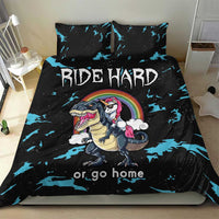 Black bedding set featuring “Ride Hard” text, blue splatter print, dinosaur and unicorn artwork