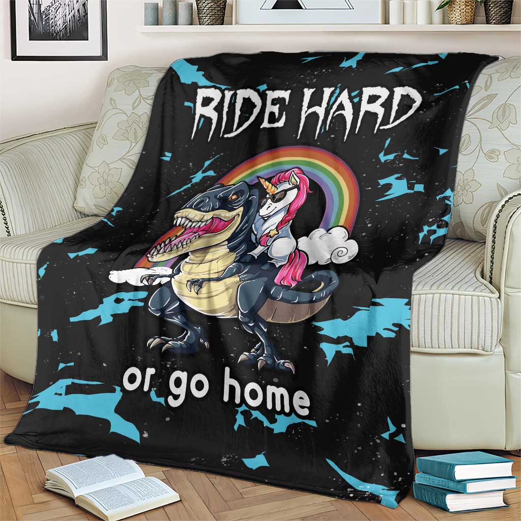 Black dinosaur and unicorn blanket with rainbow graphic, blue splatter accents, "or go home"