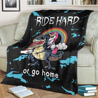 Black dinosaur and unicorn blanket with rainbow graphic, blue splatter accents, "or go home"