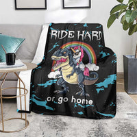 Black throw blanket with dinosaur and unicorn character art and "RIDE HARD" lettering