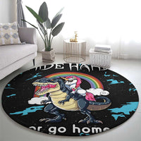 Black round dinosaur and unicorn carpet with rainbow circle and 'go home' lettering at edge