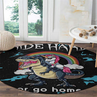 Black round carpet close-up: dinosaur and unicorn with rainbow and 'go home' text