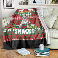 Red Christmas dog blanket with white lettering: “They see you…eating snacks”