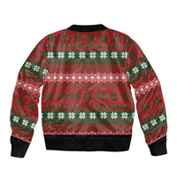 Red bomber jacket back with holiday fair-isle pattern and snowflake motifs, black rib cuffs