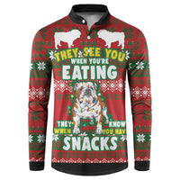 Red and green Christmas button sweatshirt with bulldog graphic and bold 'SNACKS' text