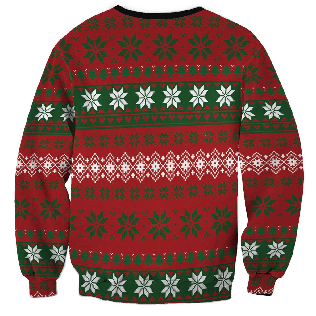 Red Christmas sweatshirt with green holiday knit pattern on back