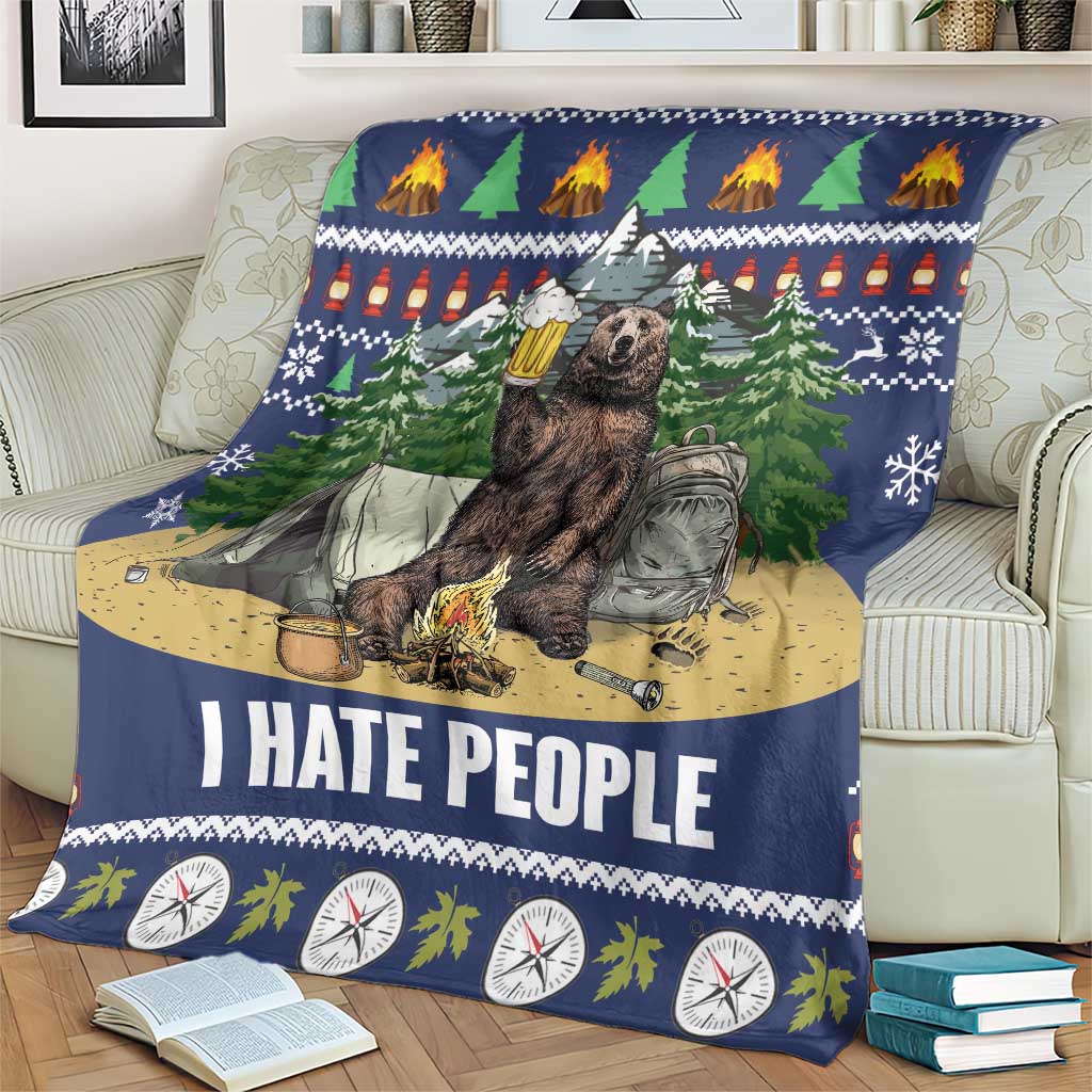 Blue bear camping Christmas blanket on couch with 'I HATE PEOPLE' and campsite icons