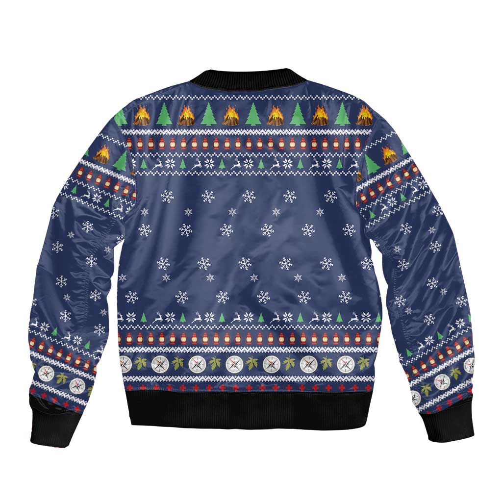 Unisex blue bomber jacket, ribbed hem and cuffs, holiday pattern of trees and snowflakes