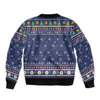 Unisex blue bomber jacket, ribbed hem and cuffs, holiday pattern of trees and snowflakes