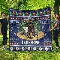 Blue camping bear quilt hung outdoors with pine, tent graphic, and “I HATE PEOPLE”