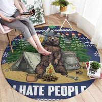 Round blue camping rug with seated bear, tent scene, and 'HATE PEOPLE' lettering