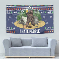 Blue Christmas bear camping tapestry with tent, backpack, trees, and bold “I HATE PEOPLE”