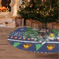 Round blue Christmas tree skirt with bear camping graphic and tassel trim