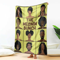 Yellow blanket with portrait mosaic faces and 'THE MELANIN BUNCH' lettering