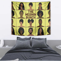 Yellow wall tapestry showing a grid of face silhouettes with 'THE MELANIN BUNCH'
