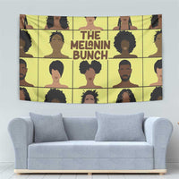 Yellow tapestry with centered 'THE MELANIN BUNCH' over a grid of face portraits