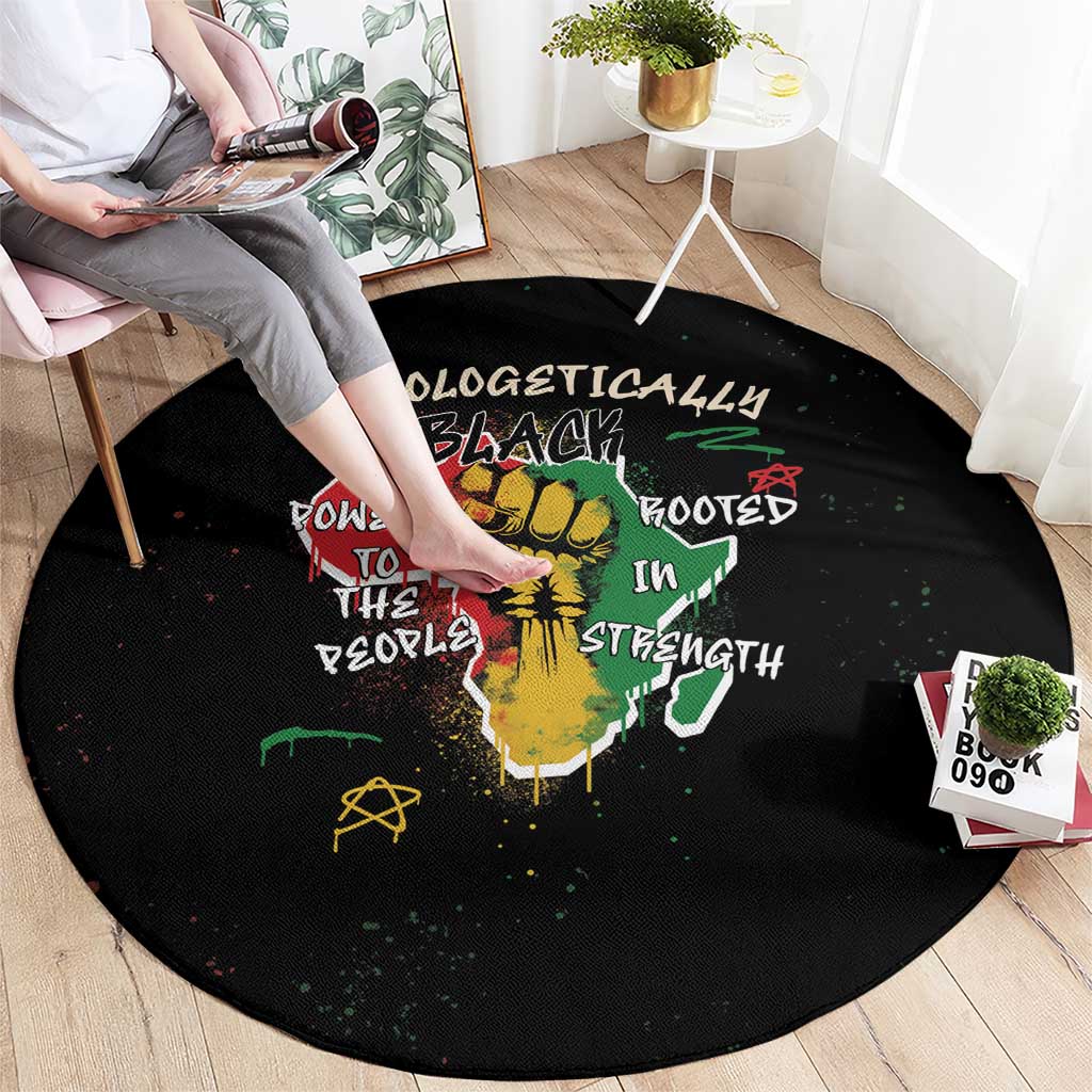 Black round carpet with colorful graffiti-style wording and lion symbol